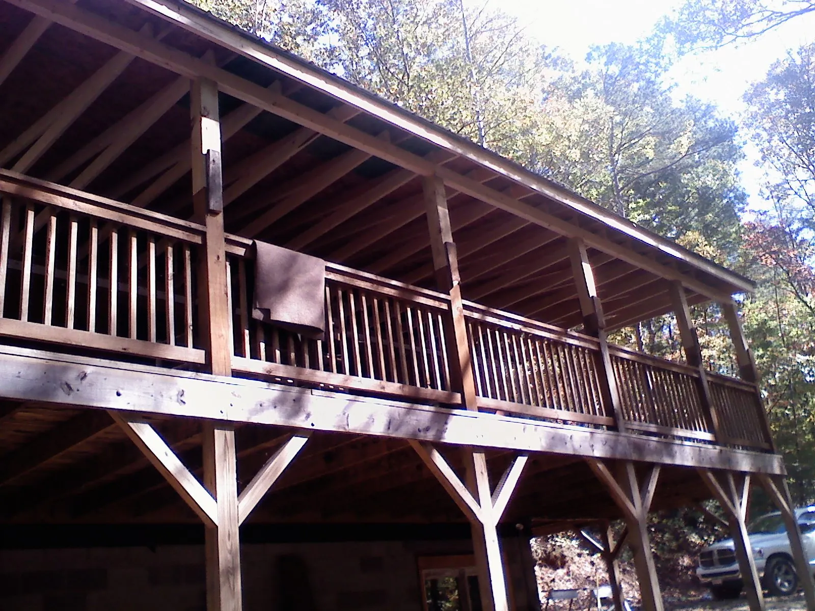 Timber framing under a new elevated porch and deck — Roof Leak Repair in North Palm Beach by Roofing Brothers